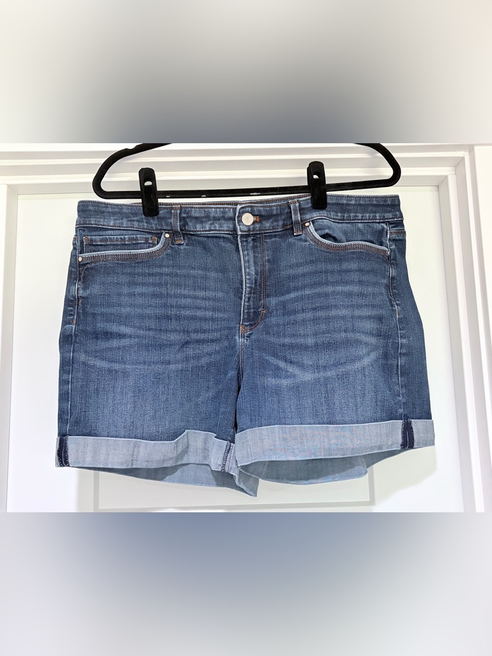Size 16. White House Black Market The 5” Short. Classic Mid Wash Denim Shorts